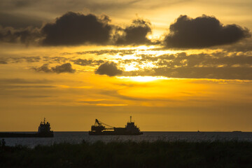 Sunset Background with ships silhouette