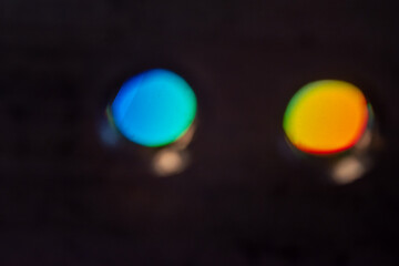 Abstract photo of the reflection of a cd through a small hole producing a space window like appearance