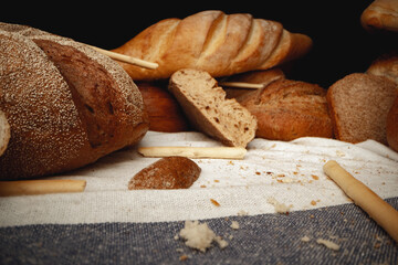 Variety of bread on tablecloth close up