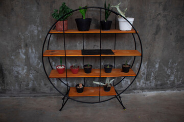 A place for a round ornamental plant shelf and some plants