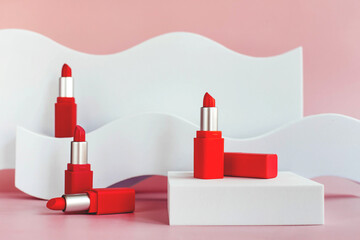 Mockup of red lipsticks on a white staircase with geometric shapes and a podium. Background for...