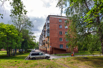 House territory near apartment buildings. Russia