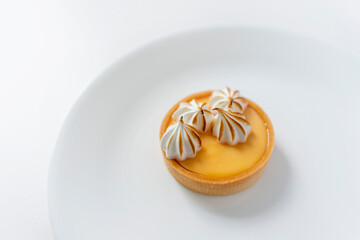 Lemony Meringue Tart on a white plate