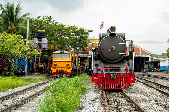 THON-BURI Bangkok Noi Railway Station, Thailand - 06 Oct 2018 : Steam Locomotive Pacific And Diesel Electric Locomotives Parking On The Tracks For Checking And Maintenance At Thonburi Train Depot.