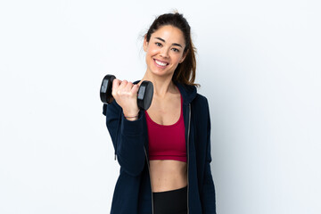 Sport woman making weightlifting over isolated white background smiling a lot