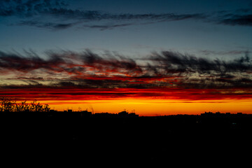 dramatic summer evening orange sky, bright colorful sunset