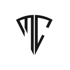 Fototapeta premium initials letter MC logo design with triangle shape shield vector