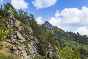 Unusual rocks in the mountains. Nature Of Mountain Kolyvan. Mount Sinyukha. Altai Krai, Siberia, Russia.