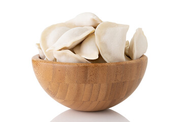 frozen dumplings in wooden bowl isolated on white background
