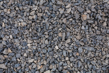 brick rubble debris on construction site. inorganic crushed stone, non-round, loose material with grains. Artificially obtained by crushing coarse-grained rocks and pebbles, accidentally mined
