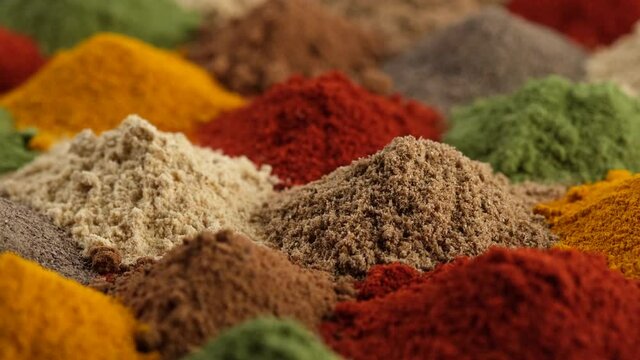 All spices. Various Spices and herbs close up, rotate. Assortment of Seasonings, Dry colorful condiments. 4K UHD video