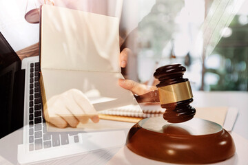 justice and law concept.Male judge in a courtroom on wooden table and Counselor or Male lawyer...