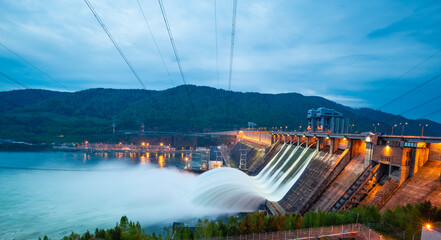 view of the hydroelectric dam, water discharge through locks - obrazy, fototapety, plakaty