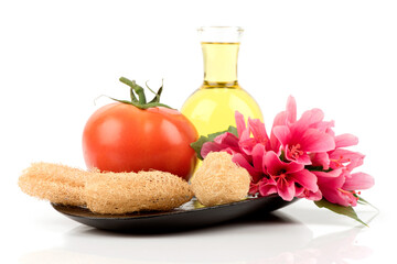 Nourish your skin and hair with hibiscus flowers, tomato and oil.