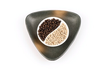 Black and white pepper isolated on white background.top view,flat lay.