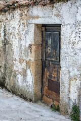 Old Weathered Door.
Old, Weathered, Rusty Door Of An Abandoned Stone And Mud House In A Town In Extremadura, Spain.