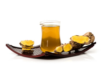 Zingiber montanum or phlai rhizome and oil isolated on white background.