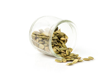 Pumpkin seeds isolated on white background.