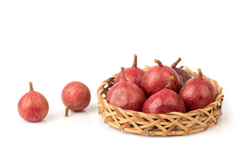Red cluster fig or ficus racemosa fruits isolated on white background.