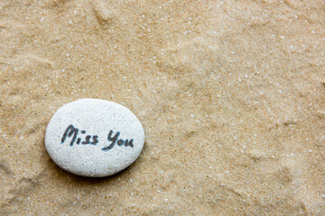 Miss you whiten on the rock and on sandy beach.