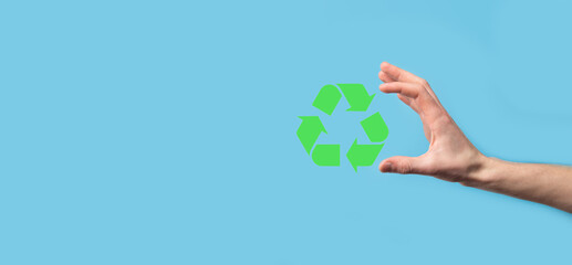 Hand hold recycling icon.Ecology and renewable energy concept.ECO sign, Concept Save green planet. Symbol of environmental protection.Recycling waste.Symbol of earth day, concept of nature protection
