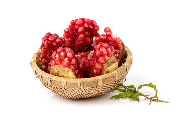 Pomegranate red seeds in fruit isolated on white background.