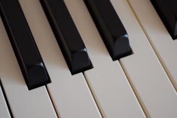 Piano black and white keyboard - obrazy, fototapety, plakaty