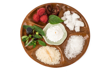 Soak hair with false daisy,bixa orellana,jasmine rice,menthol, camphor and borneol isolated on white background.top view,flat lay.