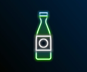 Glowing neon line Beer bottle icon isolated on black background. Colorful outline concept. Vector