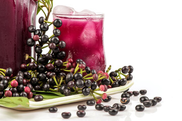 Ardisia polycephala,fruits ,green leaves and juice isolated on white background.