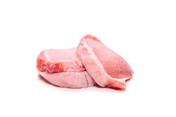 Raw pork pieces isolated on a white background.