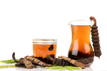 Soap pod fruits, green leaves and juice fruits isolated on white background.