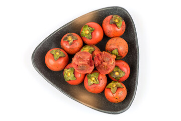 Sacred fig tree or diospyros malabarica fruits isolated on white background.