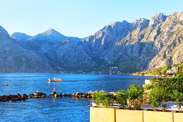 Coastal Terrace with Harbor . Coastal Getaways Surrounded by Mountains