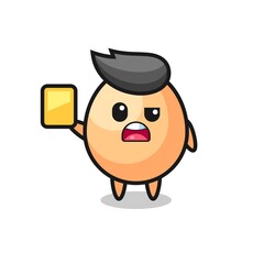 cartoon egg character as a football referee giving a yellow card