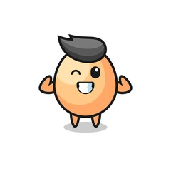 Obraz premium the muscular egg character is posing showing his muscles
