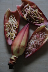 plantain flower or banana flower which is the earlier stage of banana fruit picked and placed for cooking