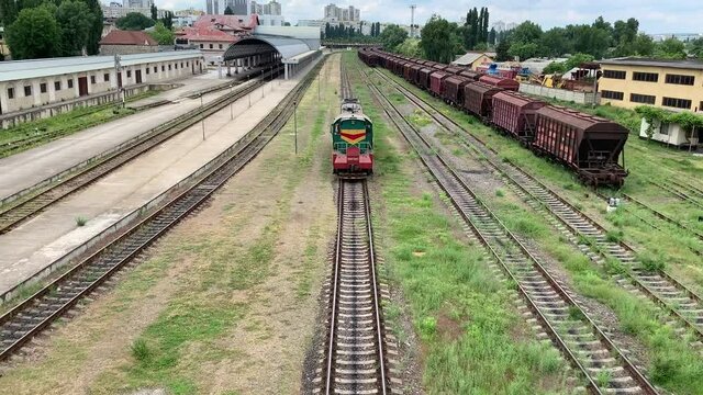 Locomotive moving along the rails, Moldova, Chisinau Railway Station, with sound
