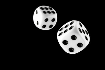 the dice are black with white dots, isolated on a black background for clipping