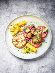Fried cheese, zucchini and baked polenta