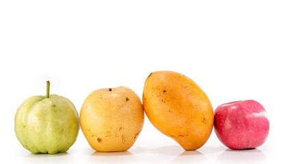 Heap of different fruits and berries isolated on white background

