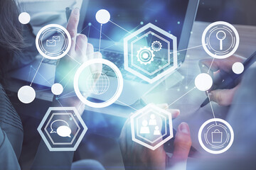 Double exposure of man and woman working together and social network theme hologram drawing. People connection concept. Computer background.