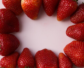 the frame for the inscription is made of strawberries