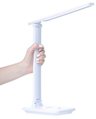 Desktop LED lamp in hand on white background isolation
