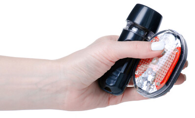 Rear bicycle light in hand on white background isolation
