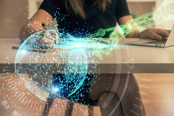 Multi exposure of woman hands working on computer and data theme hologram drawing. Tech concept.