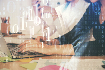 Multi exposure of woman hands working on computer and data theme hologram drawing. Tech concept.