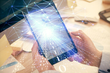 Multi exposure of man's hands holding and using a digital device and data theme drawing. Innovation concept.