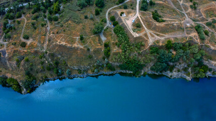 Fototapeta na wymiar Beautiful summer landscape over the river with a drone.