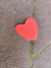 red heart on the ground